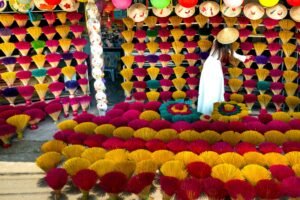 Photo by Quang Nguyen Vinh: https://www.pexels.com/photo/woman-selling-colorful-traditional-vietnamese-incense-sticks-14021006/